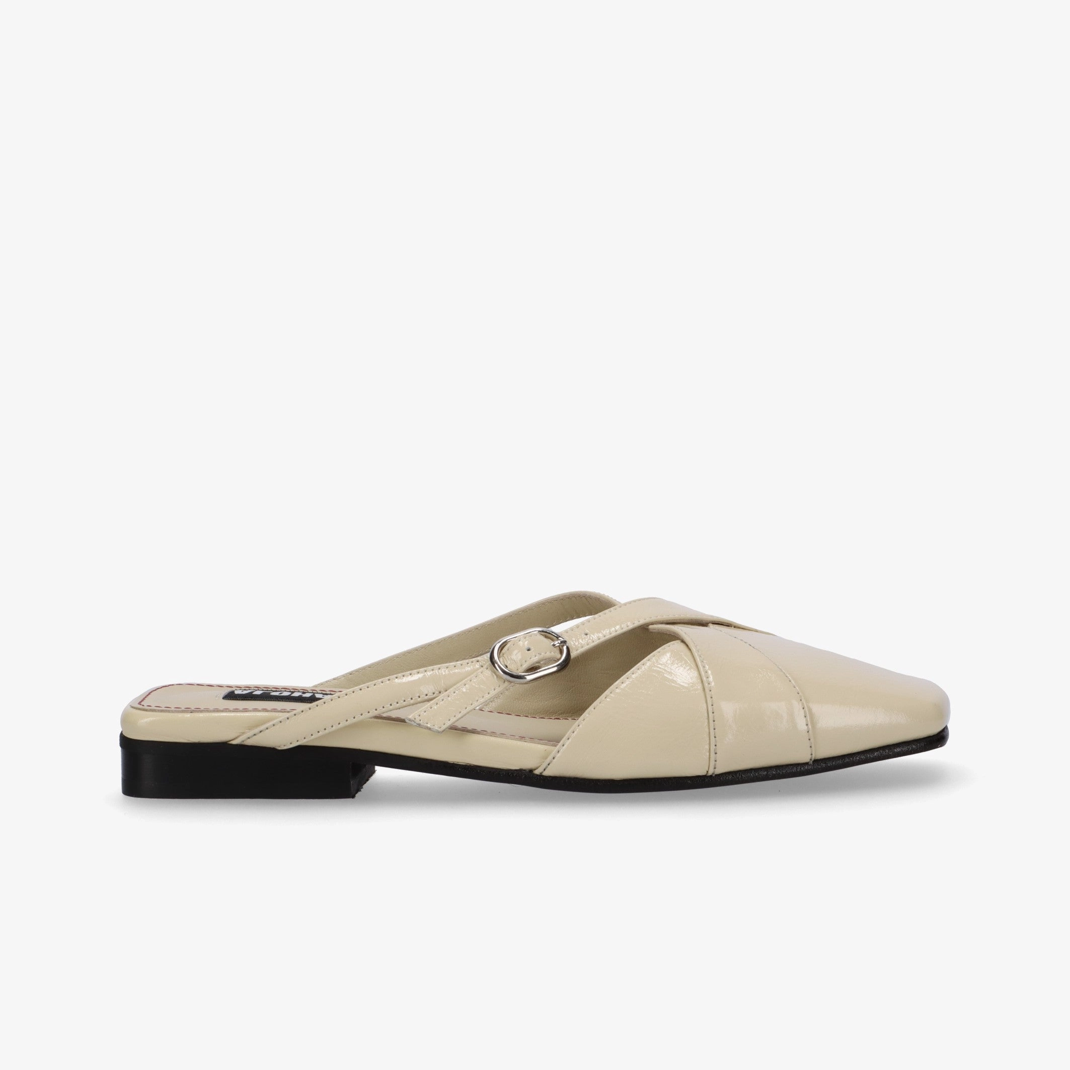 Adria Onix Cream Leather Mules PU material